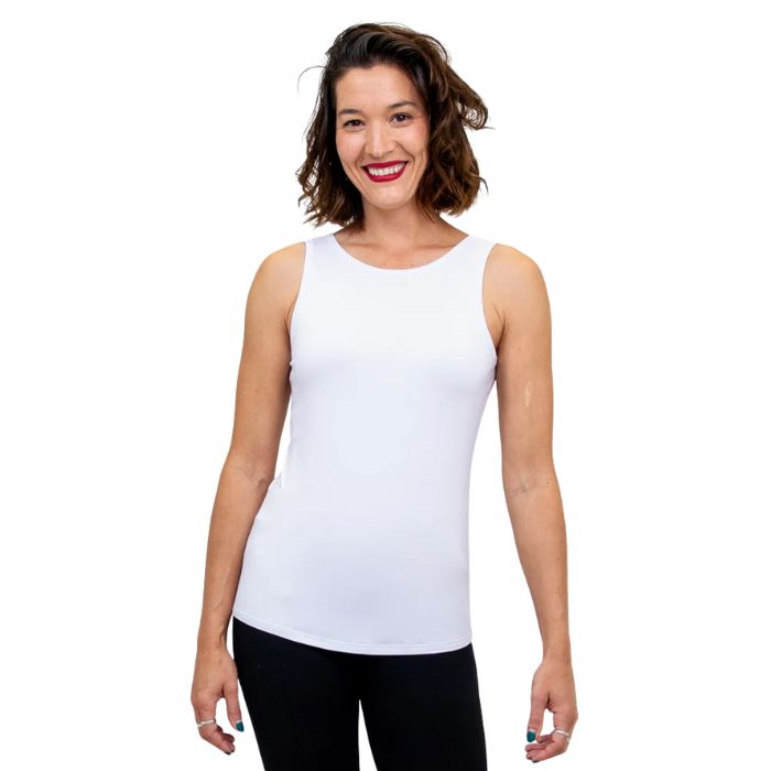 top half of female model wearing white reanna tank top top front view on white background