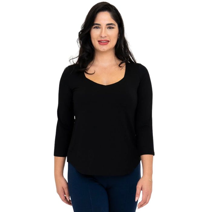 female model wearing black ritzy top front view on white background