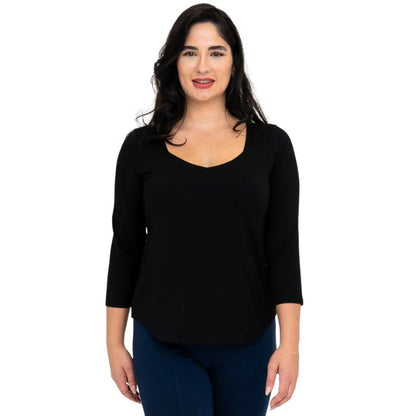 female model wearing black ritzy top front view on white background
