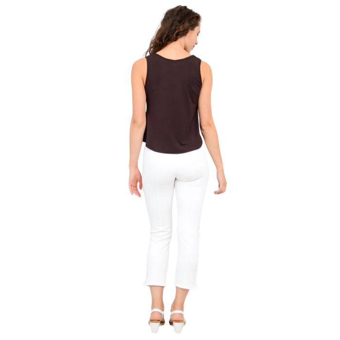 female model wearing coffee brown ritzy tank top and white nadine cropped pants back view on white background