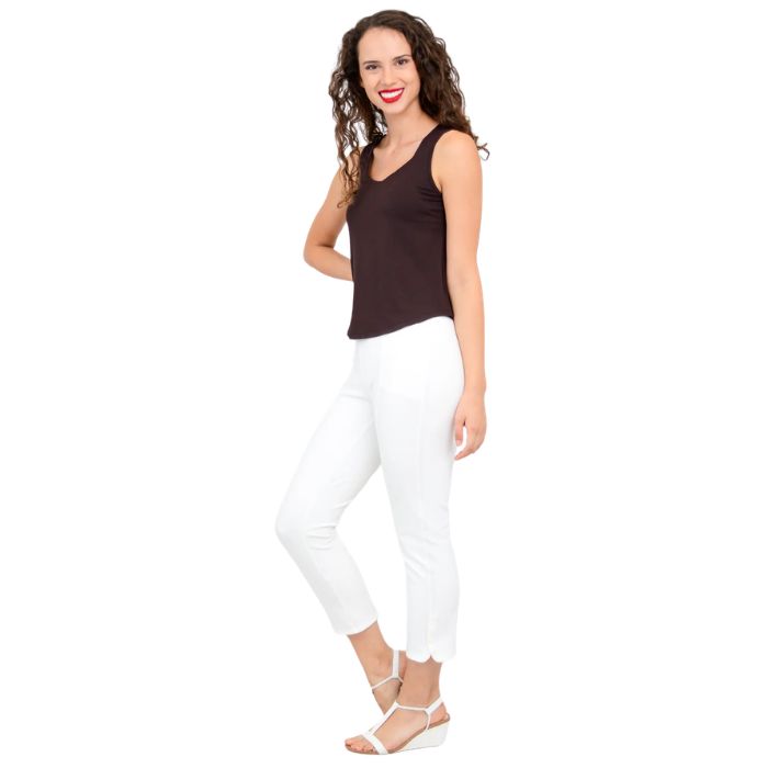 female model wearing coffee brown ritzy tank top and white nadine cropped pants side view on white background