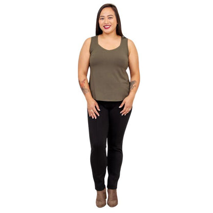 female model wearing khaki green ritzy tank top and black nadia pants front view on white background