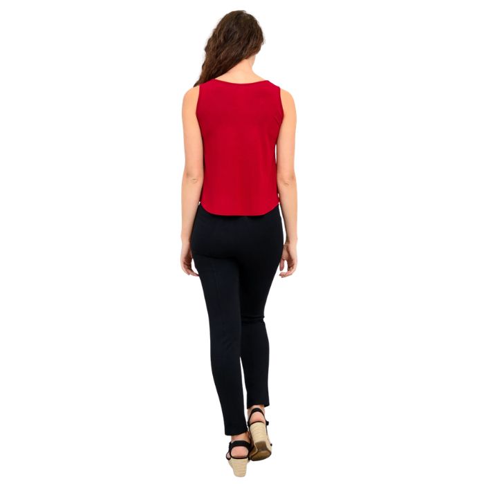 female model wearing lipstick red ritzy tank top and black nadia pants back view on white background