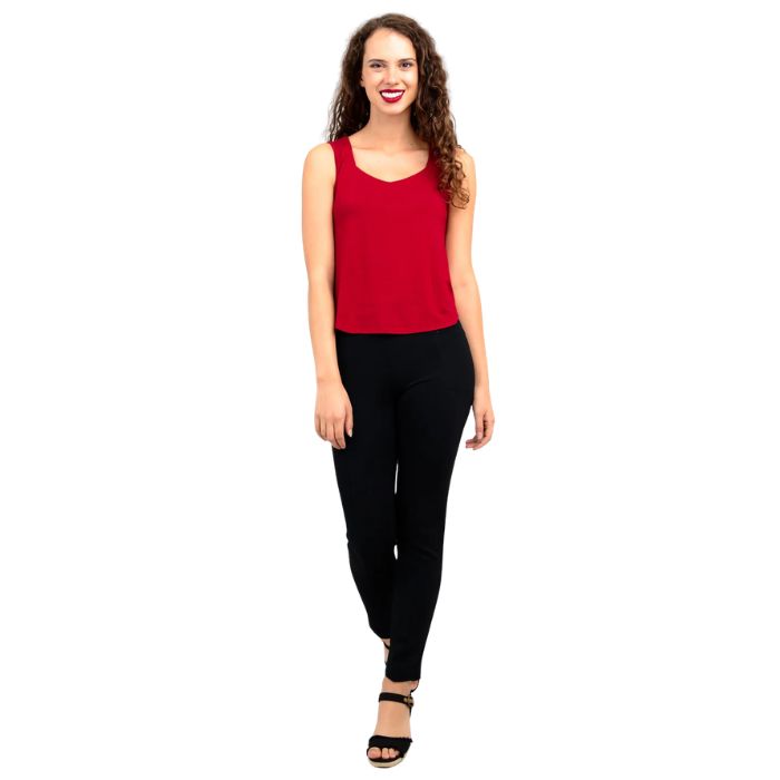 female model wearing lipstick red ritzy tank top and black nadia pants front view on white background
