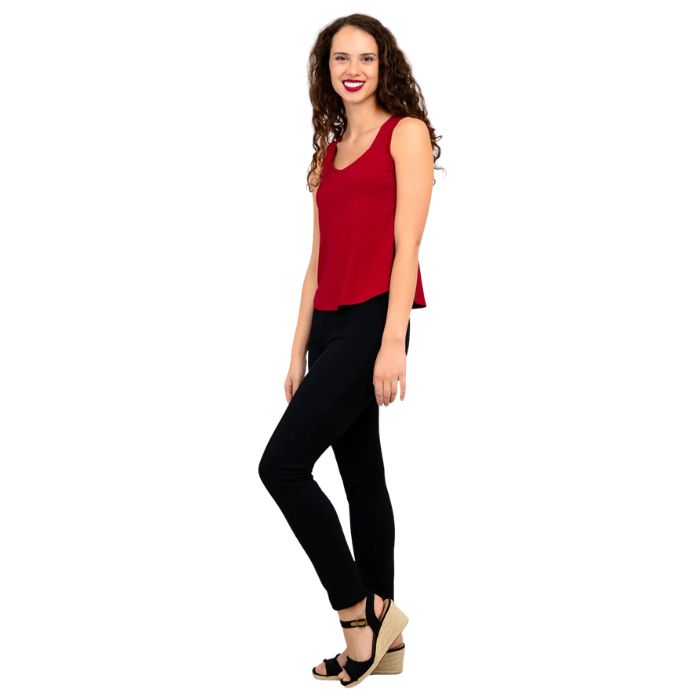 female model wearing lipstick red ritzy tank top and black nadia pants side view on white background