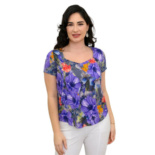 female model wearing violet bloom print ritzy top front view on white background
