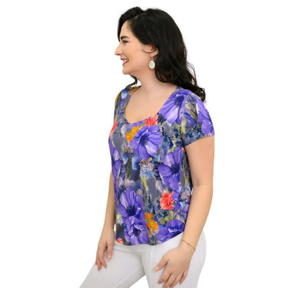 female model wearing violet bloom print ritzy top side view on white background