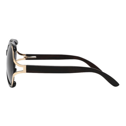 rosewood sunglasses black and gold frames and black lenses side view on white background
