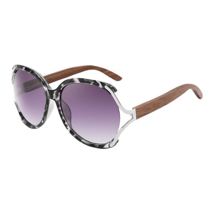 rosewood sunglasses black and white marble frames and black lenses over view on white background