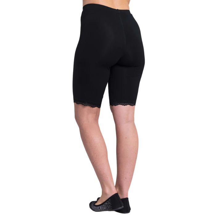 female model wearing black rubia undershorts back view on white background