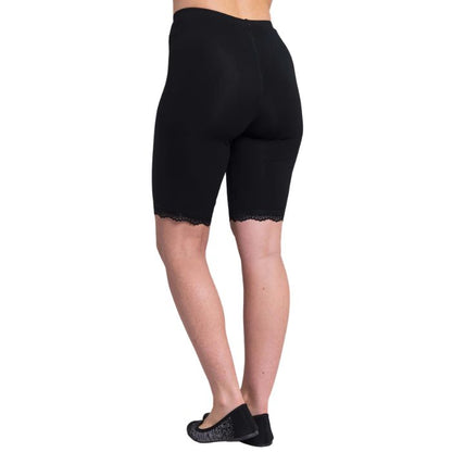 female model wearing black rubia undershorts back view on white background