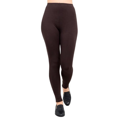 female model wearing coffee brown ruby leggings front view on white background
