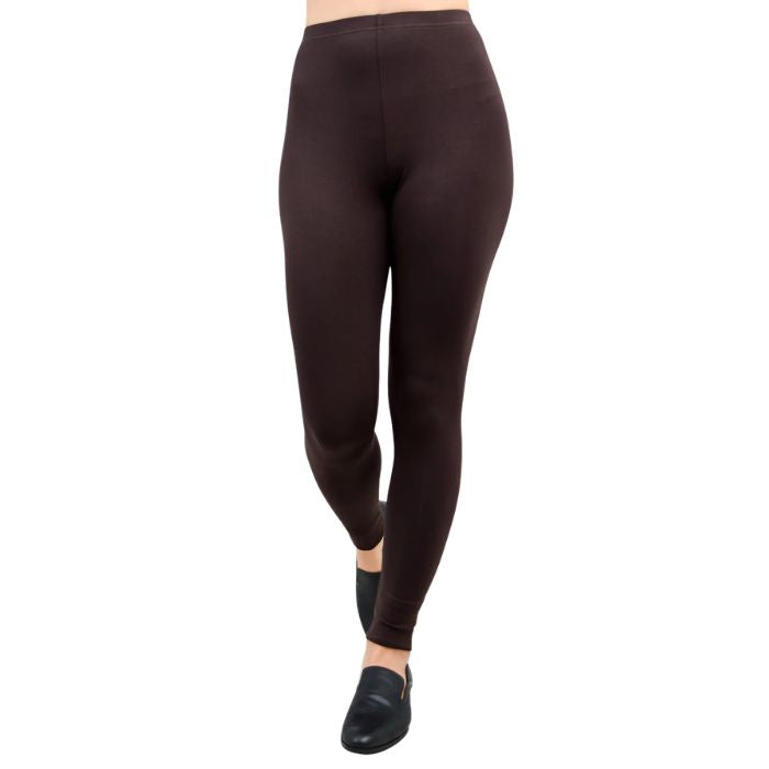 female model wearing coffee brown ruby leggings front view on white background