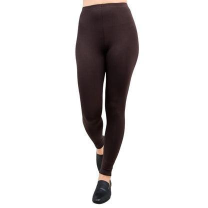 female model wearing coffee brown ruby leggings front view on white background