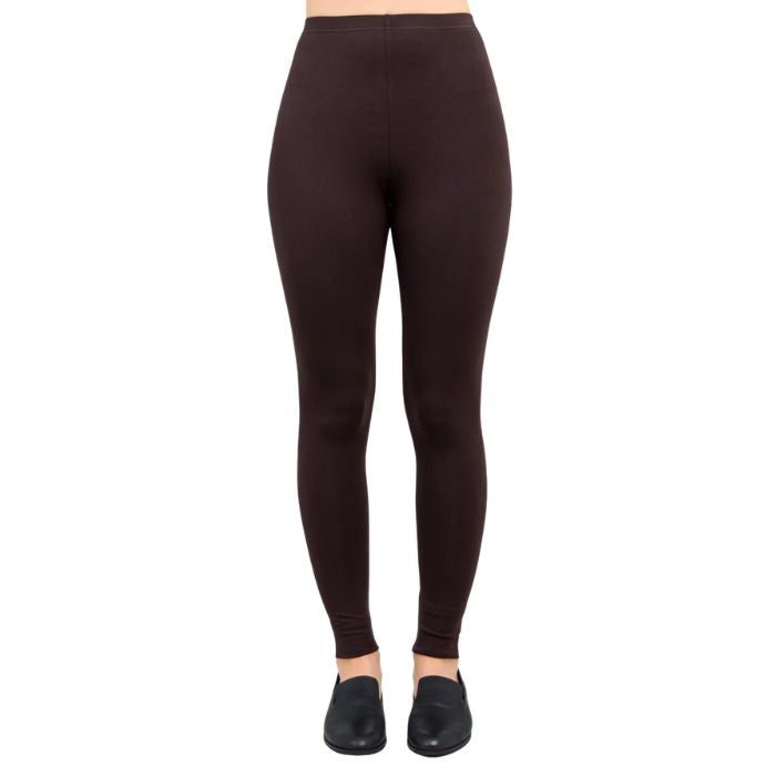 female model wearing coffee brown ruby leggings front view on white background