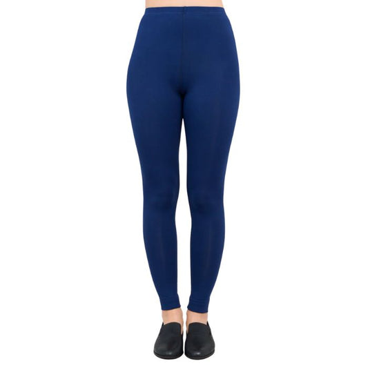 female model wearing indigo blue ruby leggings front view on white background
