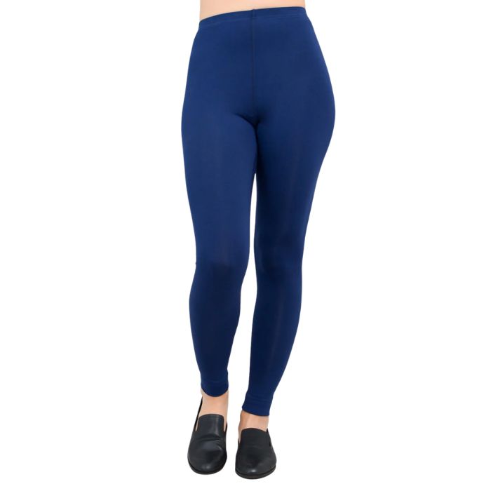 female model wearing indigo blue ruby leggings front view on white background