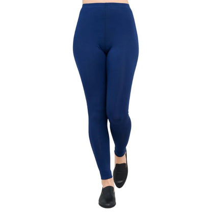 female model wearing indigo blue ruby leggings front view on white background