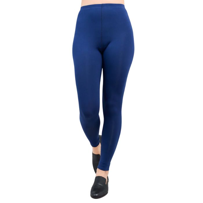 female model wearing indigo blue ruby leggings front view on white background