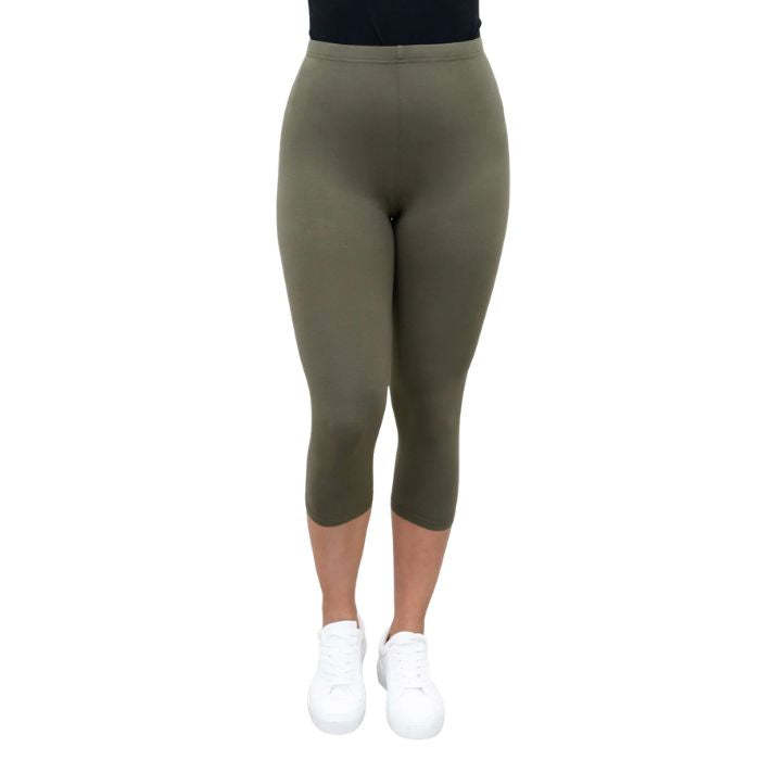 female model wearing khaki green ruby capri leggings front view on white background
