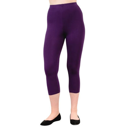 female model wearing royale purple ruby capri leggings front view on white background