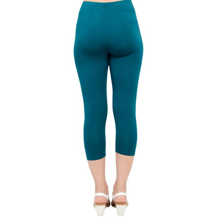 female model wearing teal green ruby capri leggings back view on white background