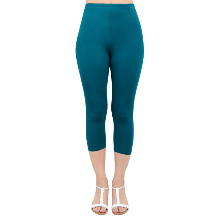 female model wearing teal green ruby capri leggings front view on white background