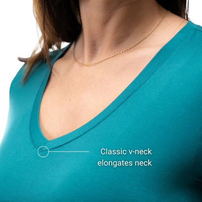 female model wearing coastal teal green rylie v-neck tee close-up front view on white bacground