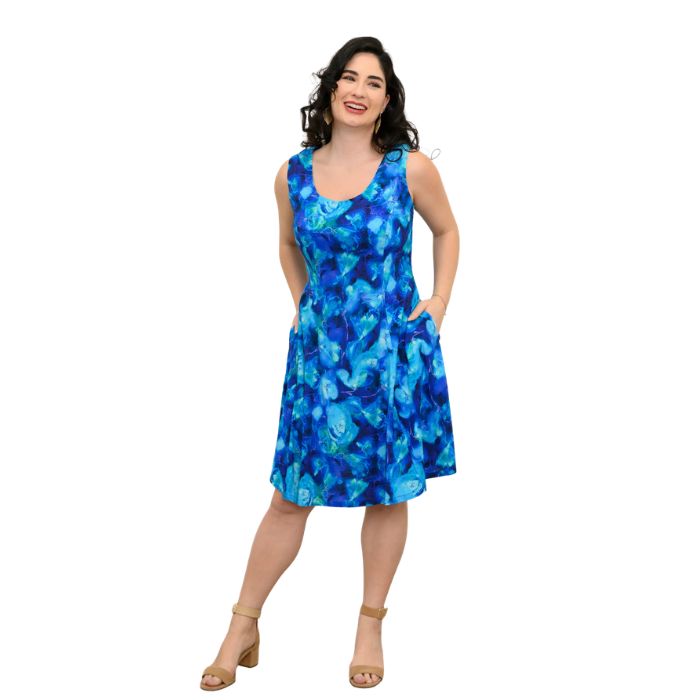 female model wearing ocean reef print sara dress front view on white background
