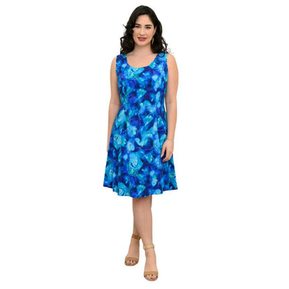 female model wearing ocean reef print sara dress front view on white background