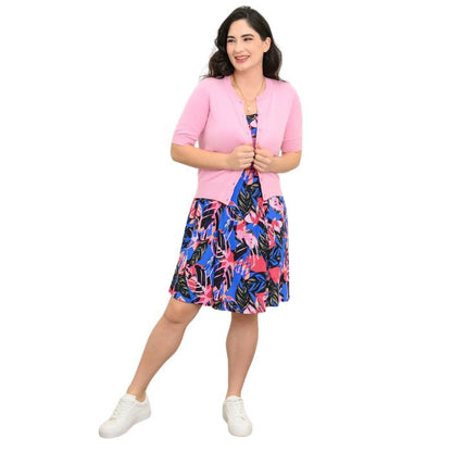 female model wearing pink bonita print sara dress and pink shen cardigan front view on white background