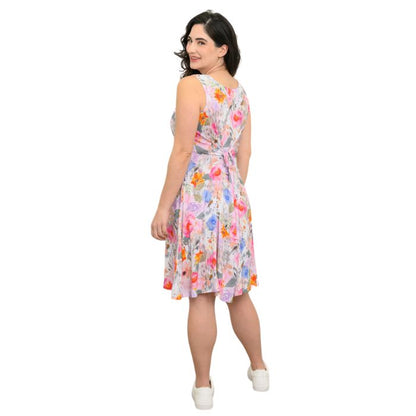 female model wearing pink bouquet print sara dress back view on white background