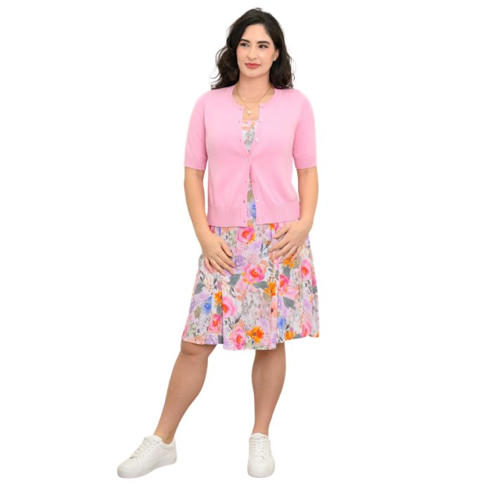 female model wearing pink bouquet print sara dress and pink shen cardigan front view on white background