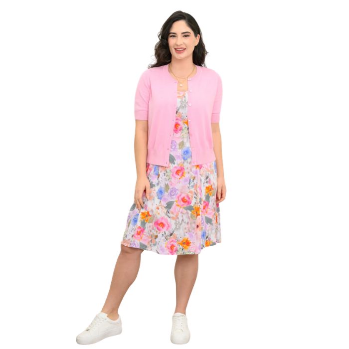 female model wearing pink bouquet print sara dress and pink shen cardigan front view on white background