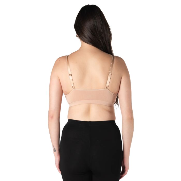 female model wearing beige brown terrera seamless adjustable bralette back view on white background