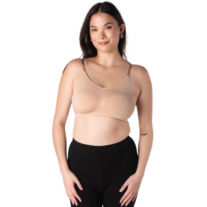 female model wearing beige brown terrera seamless adjustable bralette front view on white background