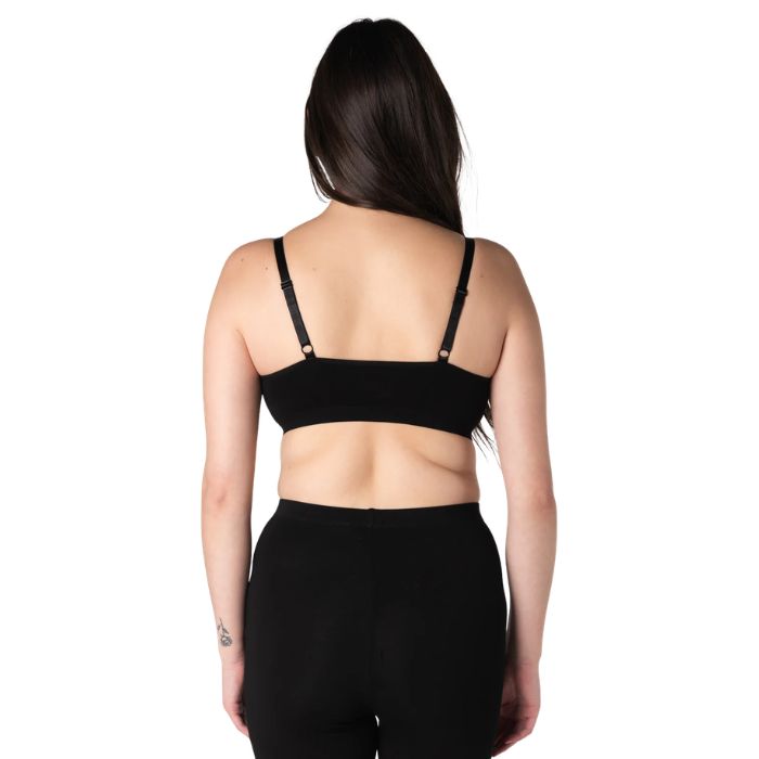 female model wearing black terrera seamless adjustable bralette back view on white background