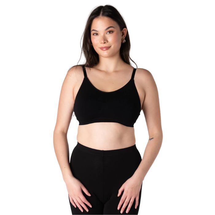 female model wearing black terrera seamless adjustable bralette front view on white background