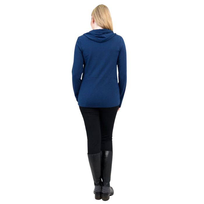 a woman wearing indigo blue seymour jacket and black dixie leggings back view set on a studio white background