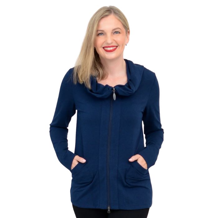 a woman wearing indigo blue seymour jacket waist up front view set on a studio white background