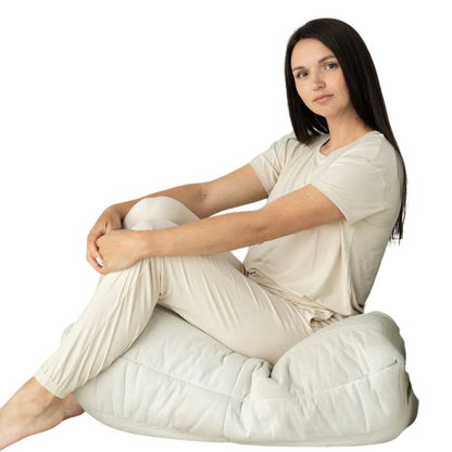 female model wearing sophie almond milk white short sleeve tee and banded ankle pant two piece pajama set front view on white background