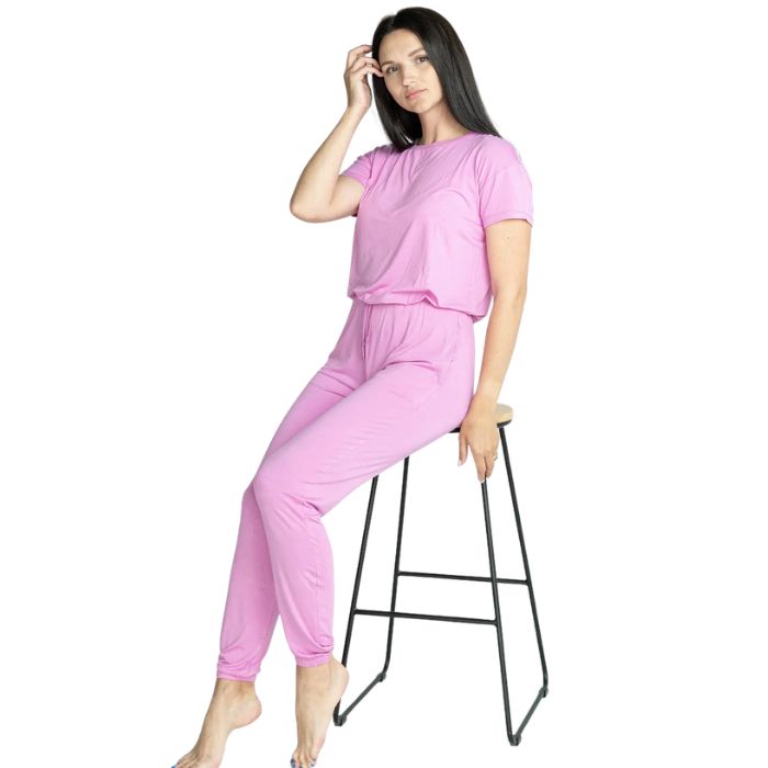 female model wearing sophie crocus pink short sleeve tee and banded ankle pant two piece pajama set front view on white background