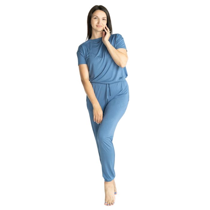 female model wearing sophie galactic blue short sleeve tee and banded ankle pant two piece pajama set front view on white background