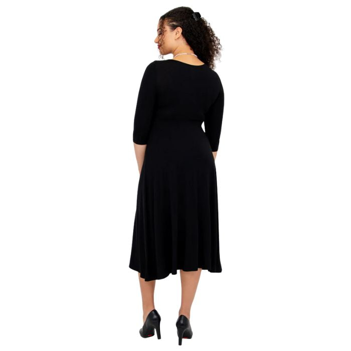 female model wearing black soul dress back view on white background