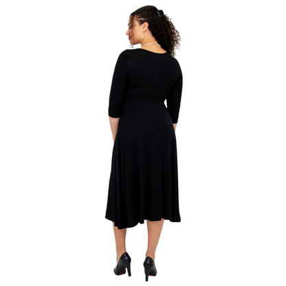 female model wearing black soul dress back view on white background