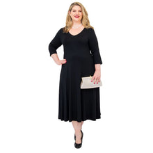 female model wearing black soul dress front view on white background