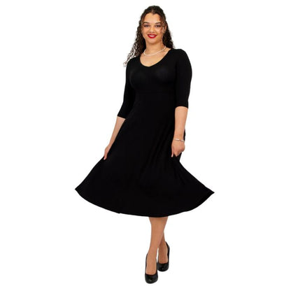 female model wearing black soul dress front view on white background