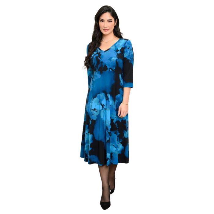 woman wearing blue space print soul dress front view set on a white background