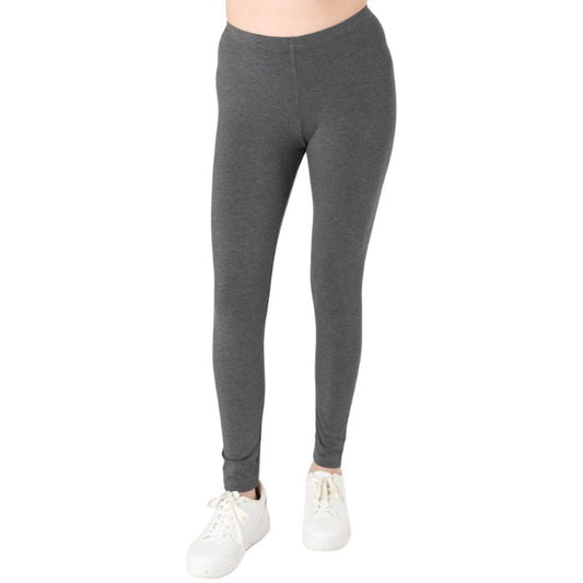female model wearing charcoal grey suri full length leggings front view on white background 