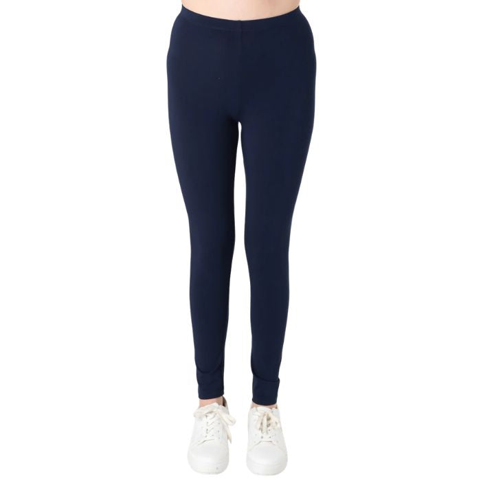 female model wearing ink blue suri full length leggings front view on white background 